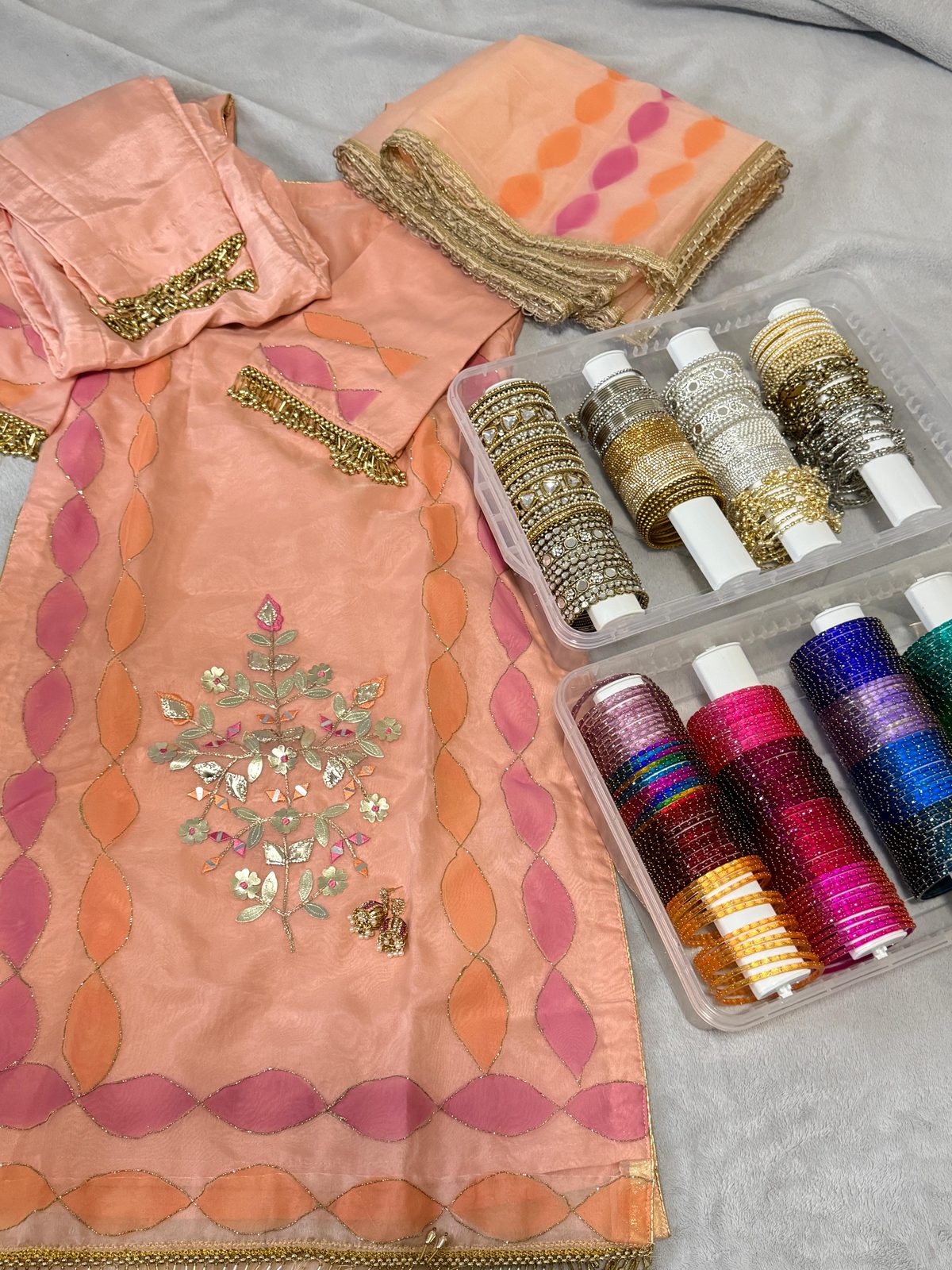 Peach embroidered suit with full bangle collection