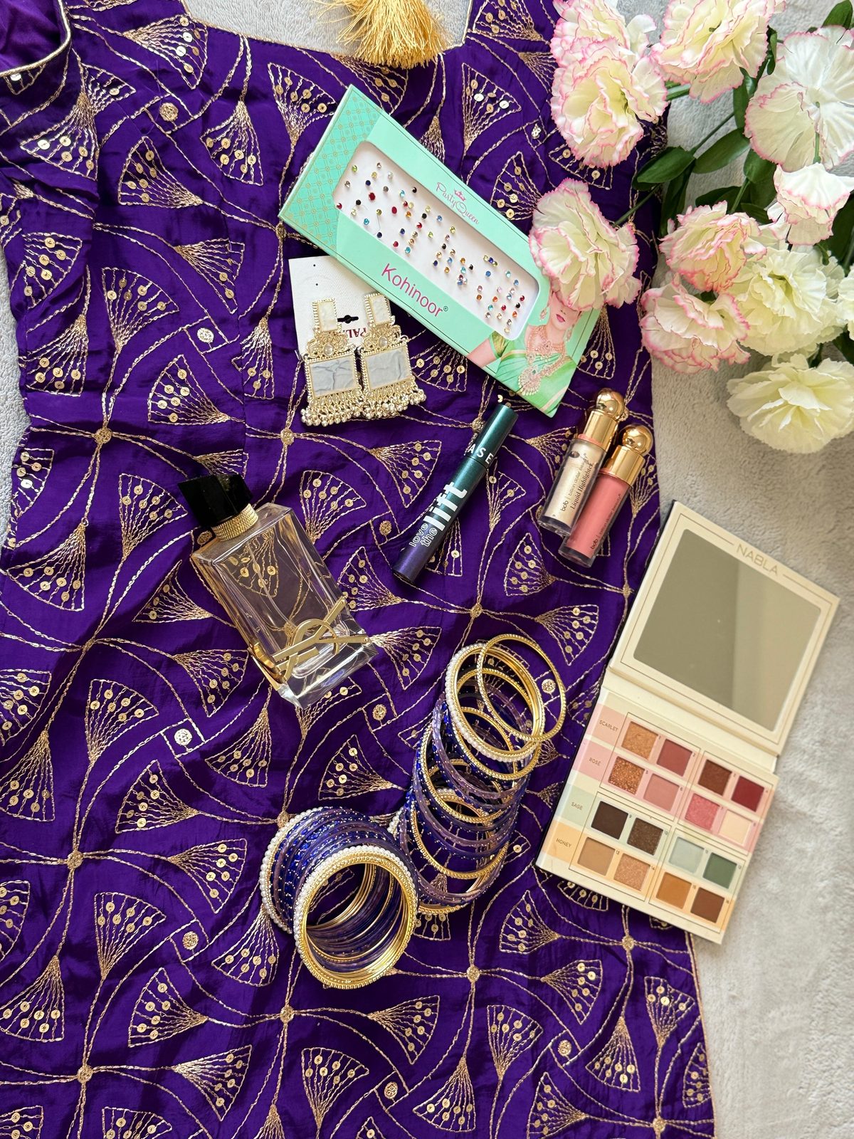 Royal purple suit flat-lay